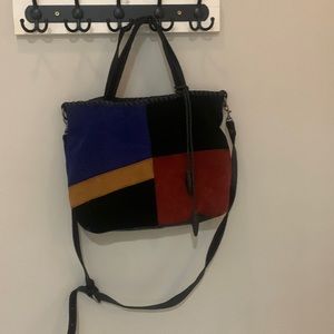 Real suede/leather bag with gorgeous details.